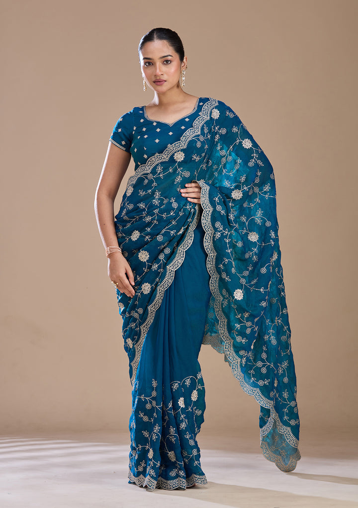 Peacock Blue Georgette Gold Zariwork Saree With Matching Blouse Piece