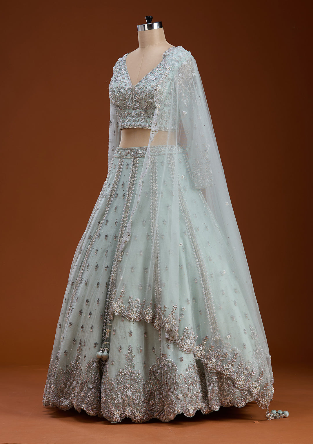 Koskii Net Sky Blue Lehenga – Embellished with Zariwork for Elegant Evenings