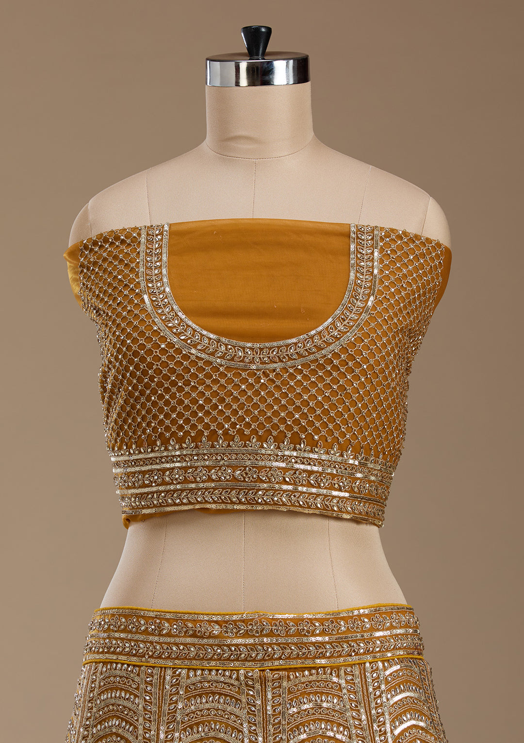 Koskii Net Golden Lehenga – Luxurious Zari Embroidery