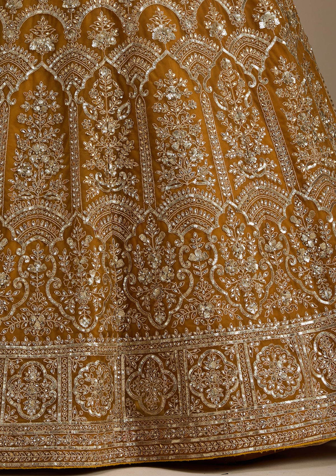Koskii Net Golden Lehenga – Luxurious Zari Embroidery