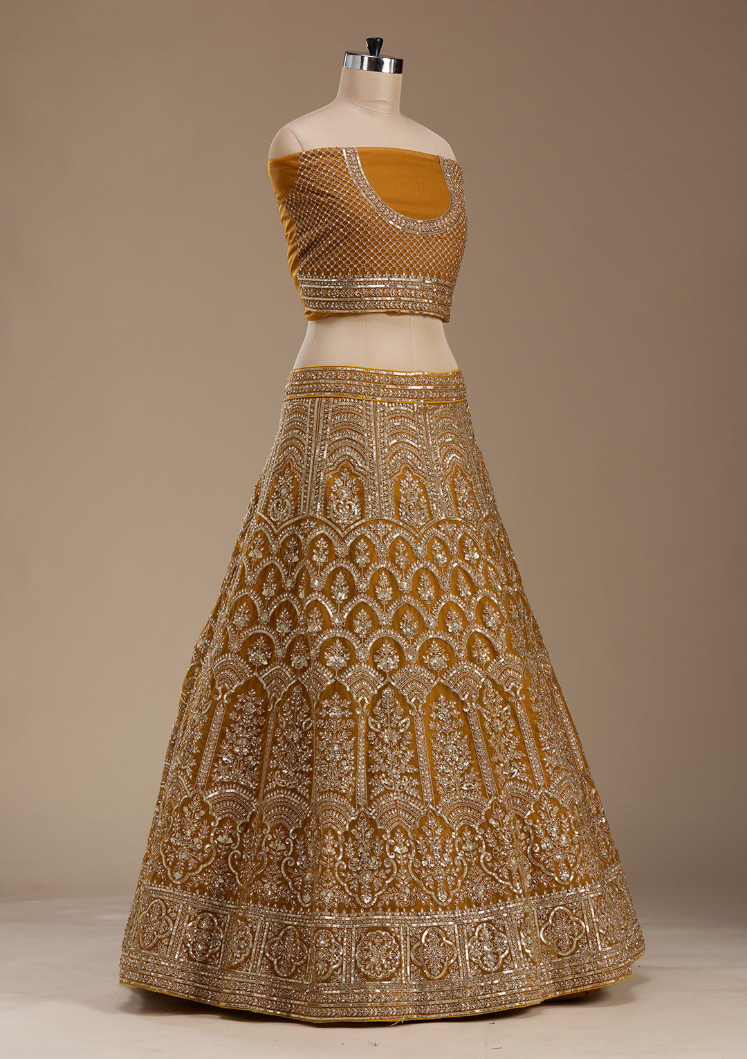 Koskii Net Golden Lehenga – Luxurious Zari Embroidery