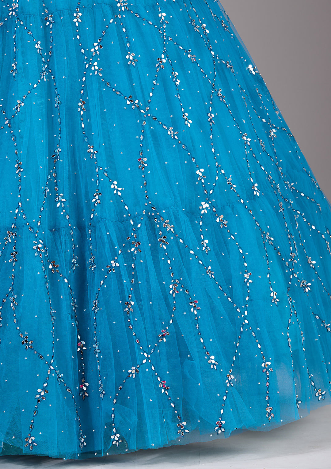 Koskii Blue Net Lehenga – Embellished with Silver Stonework