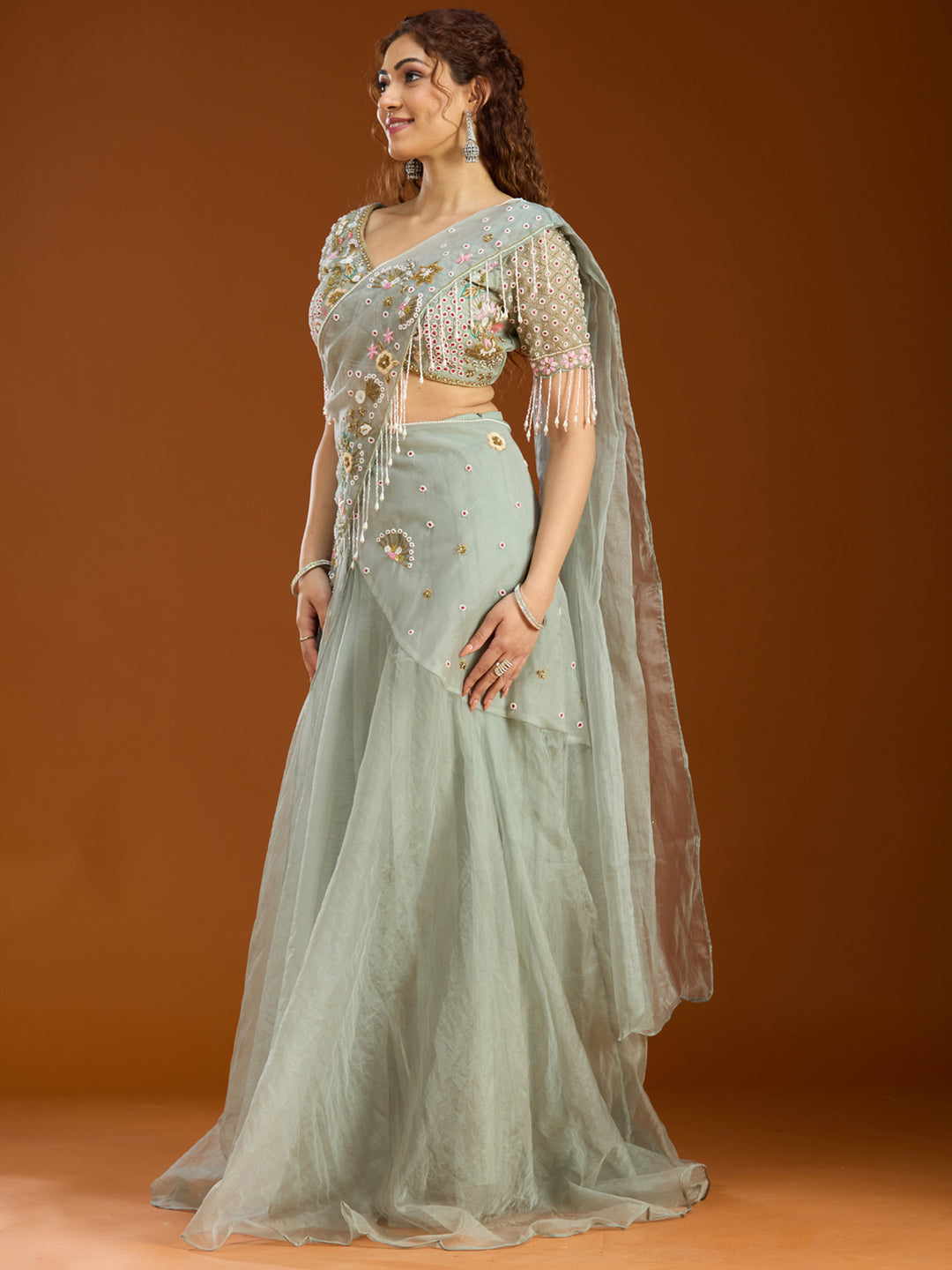 Sea Green Organza  Threadwork Saree With Matching Blouse Piece