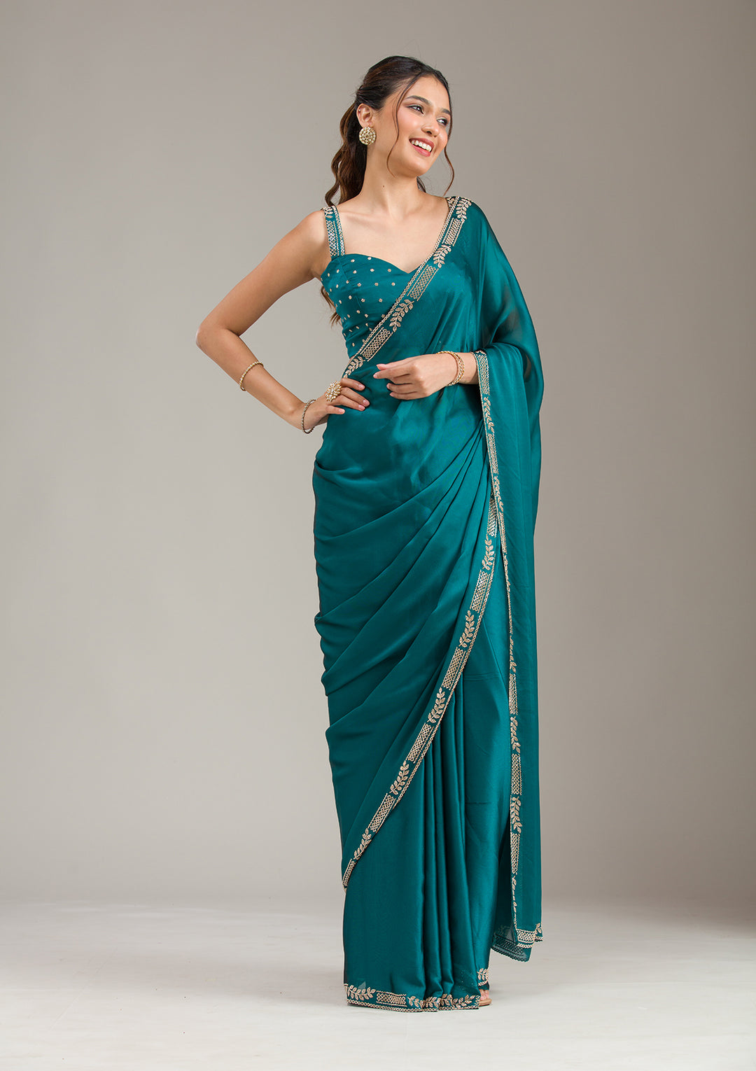 Peacock Blue Georgette Gold Stonework Saree With Matching Blouse Piece