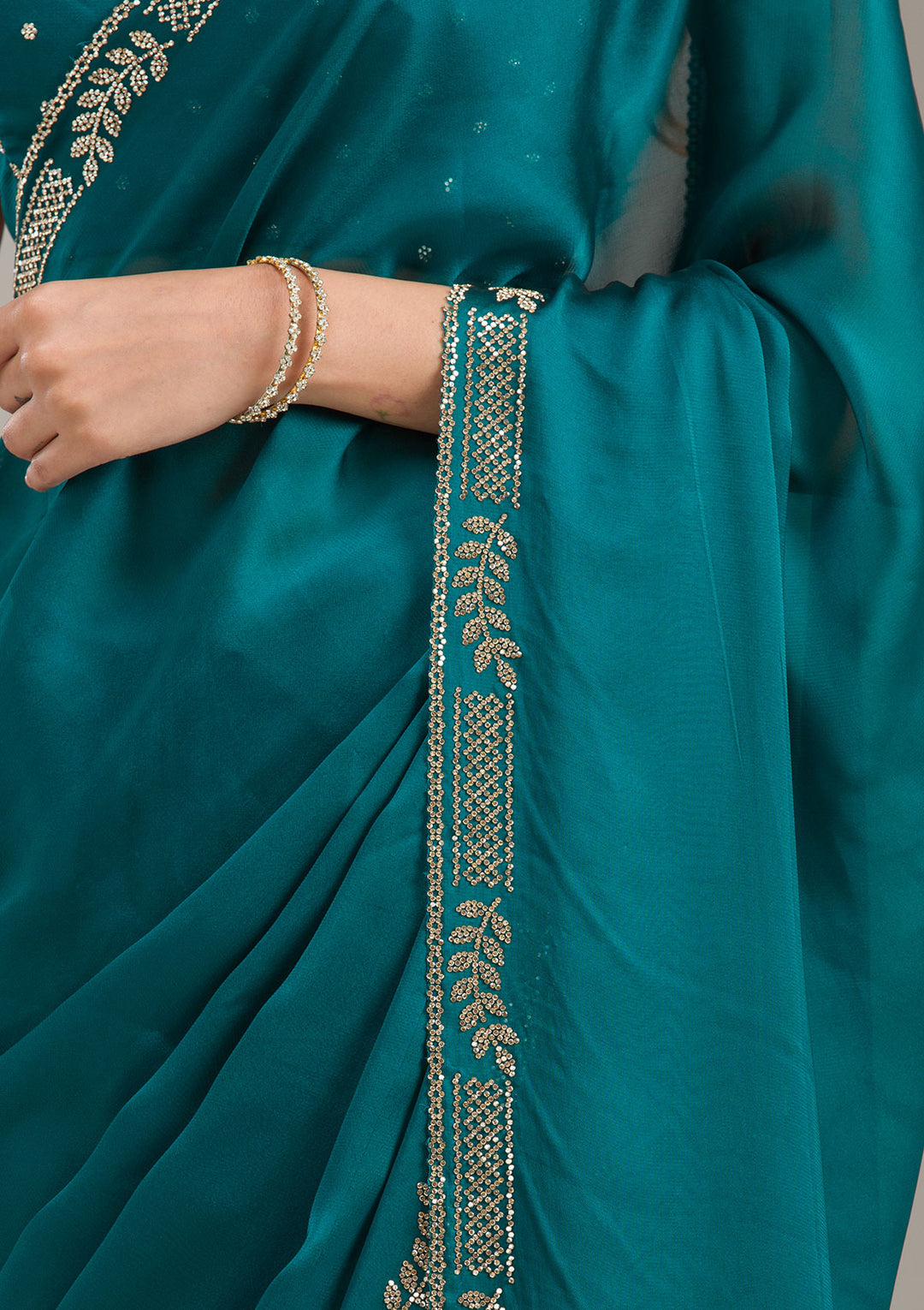 Peacock Blue Georgette Gold Stonework Saree With Matching Blouse Piece