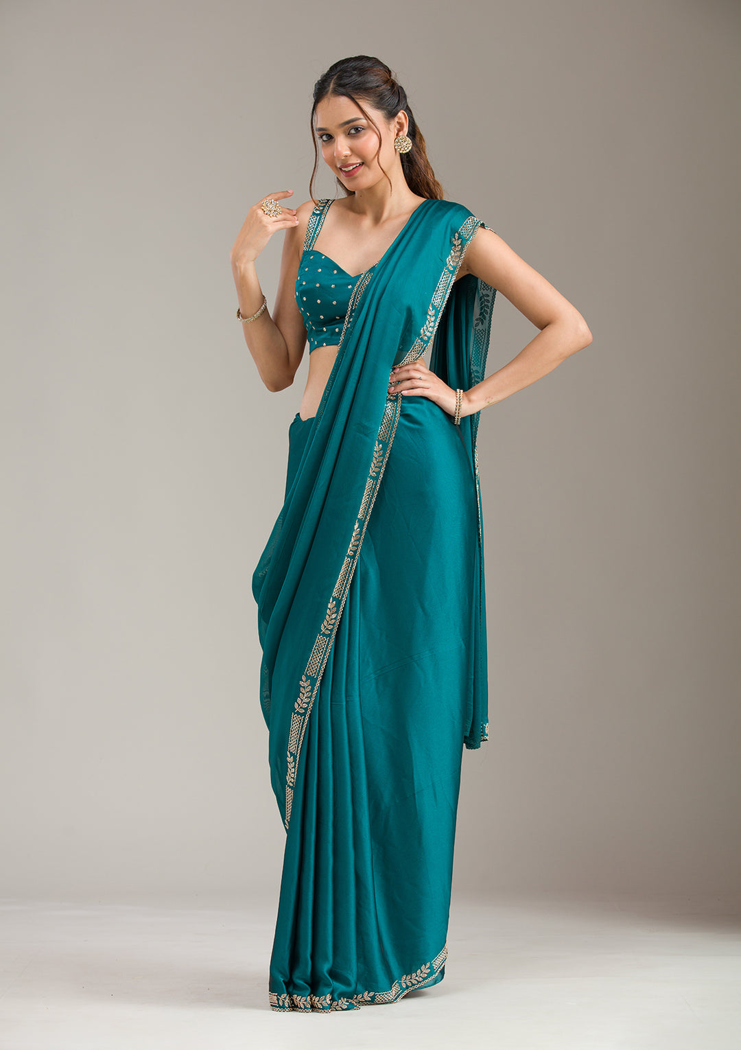 Peacock Blue Georgette Gold Stonework Saree With Matching Blouse Piece
