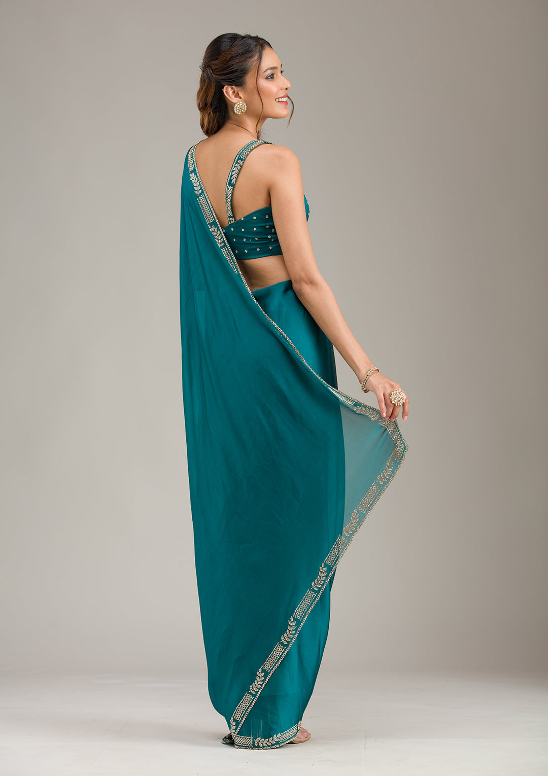 Peacock Blue Georgette Gold Stonework Saree With Matching Blouse Piece