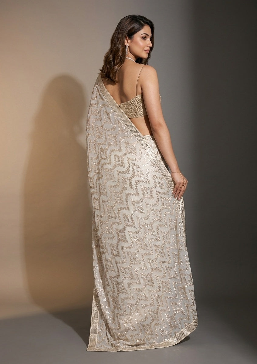 Off White Georgette Sequins Saree With Matching Blouse Piece