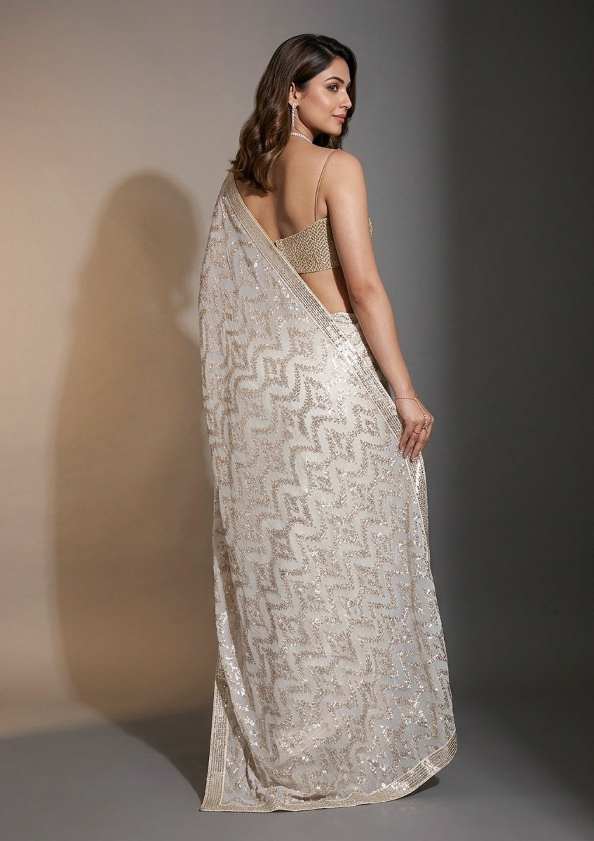 Off White Georgette Sequins Saree With Matching Blouse Piece