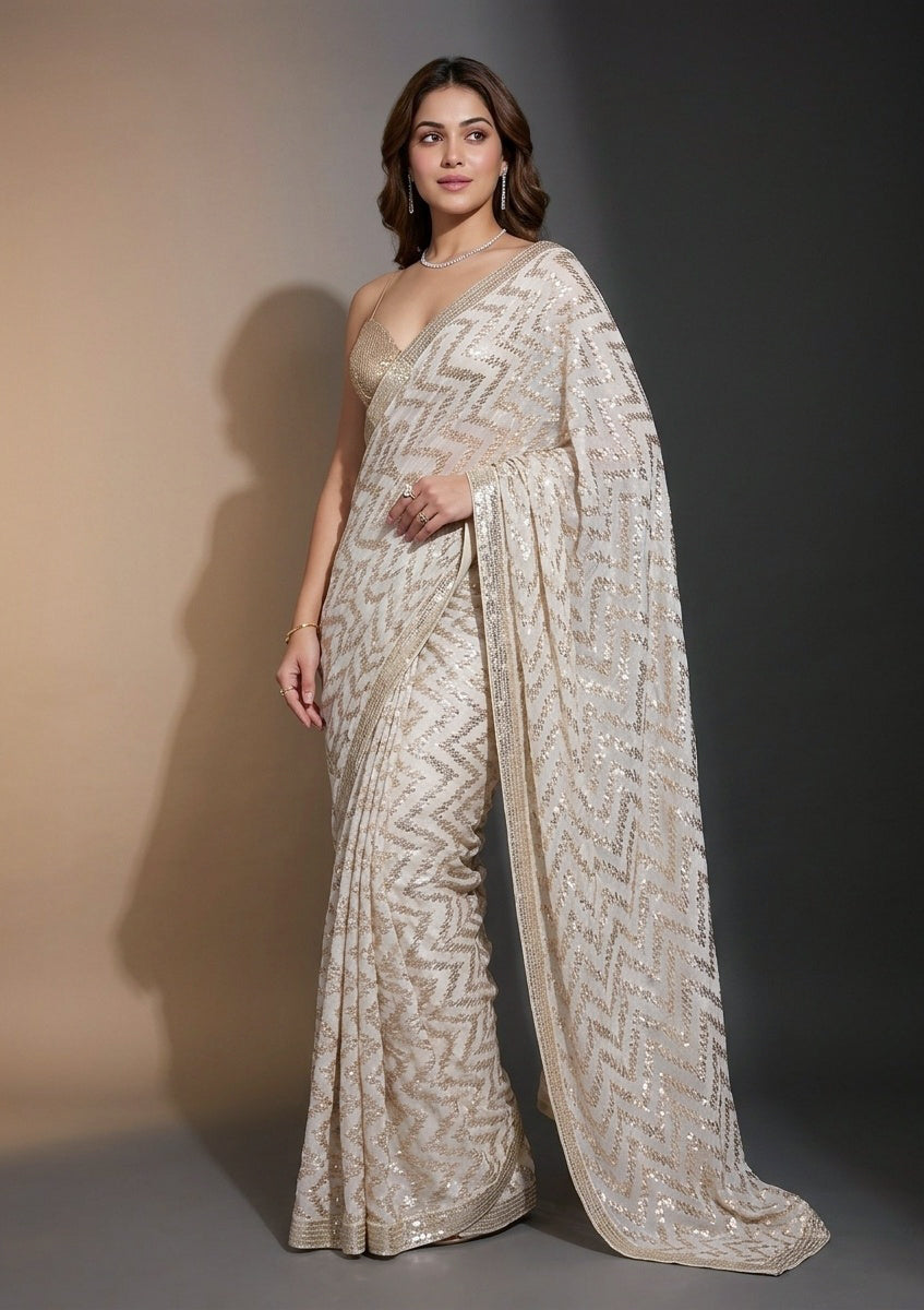 Off White Georgette Sequins Saree With Matching Blouse Piece