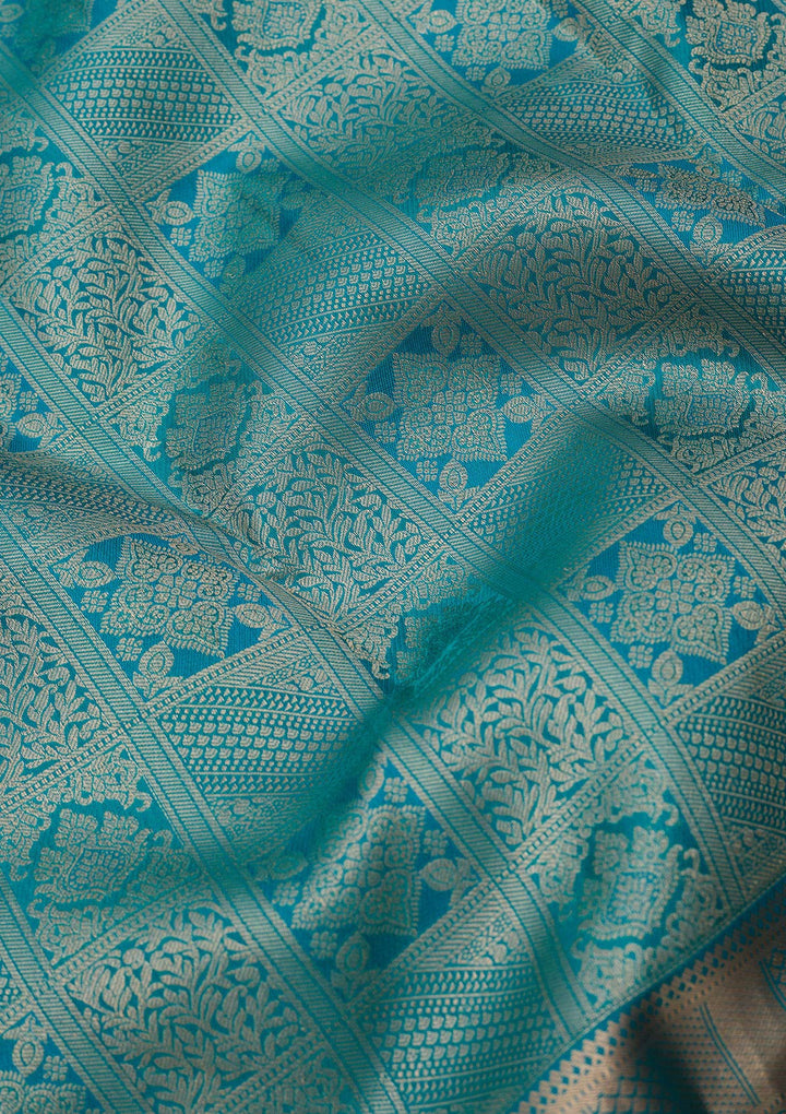 Peacock Blue Silk Jaal Gold Zariwork Saree With Matching Blouse Piece