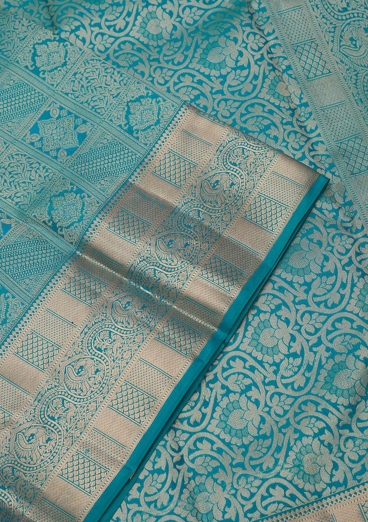 Peacock Blue Silk Jaal Gold Zariwork Saree With Matching Blouse Piece