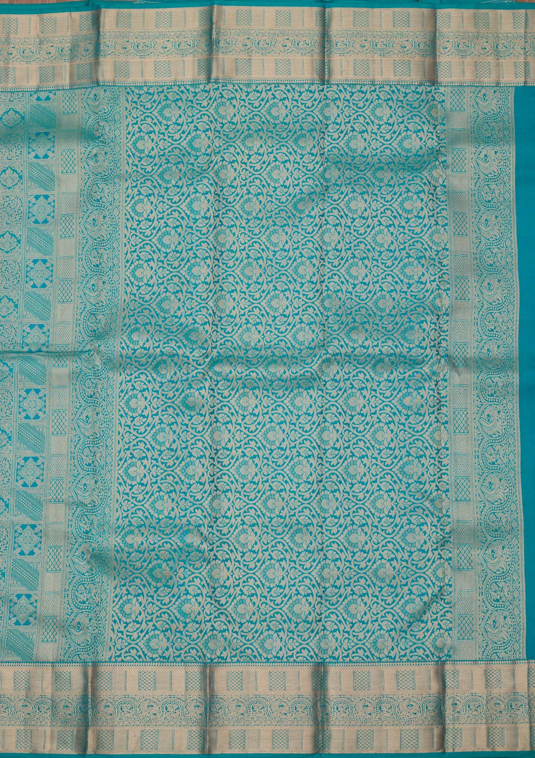 Peacock Blue Silk Jaal Gold Zariwork Saree With Matching Blouse Piece