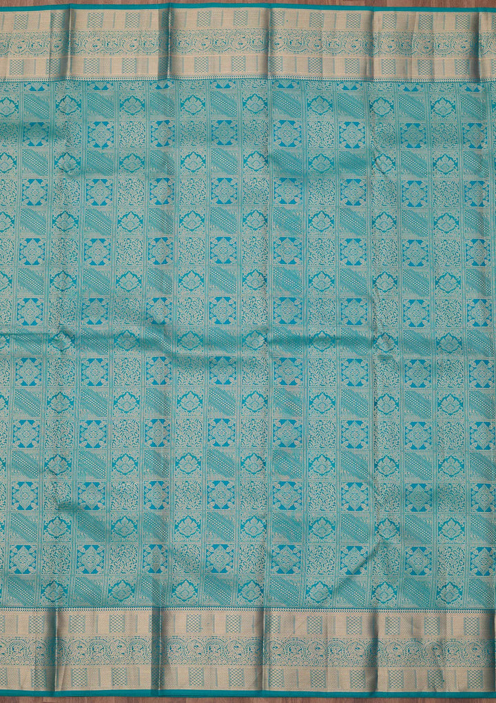 Peacock Blue Silk Jaal Gold Zariwork Saree With Matching Blouse Piece