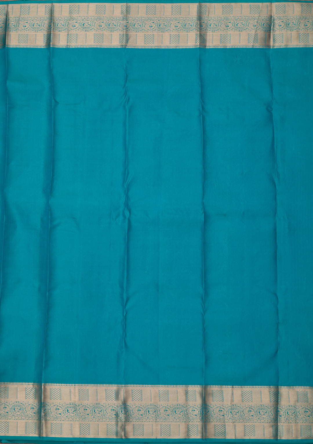 Peacock Blue Silk Jaal Gold Zariwork Saree With Matching Blouse Piece