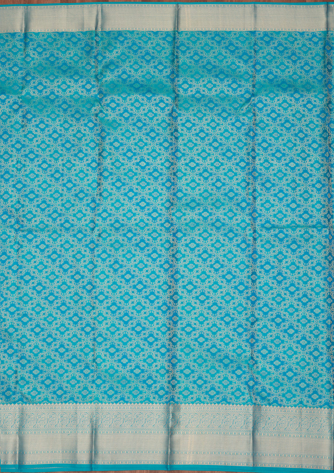 Turquoise Blue Silk Jaal Saree With Matching Blouse Piece
