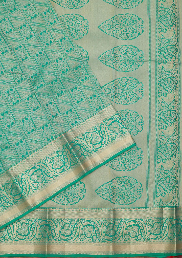 Turquoise Blue Silk Jaal Saree With Matching Blouse Piece