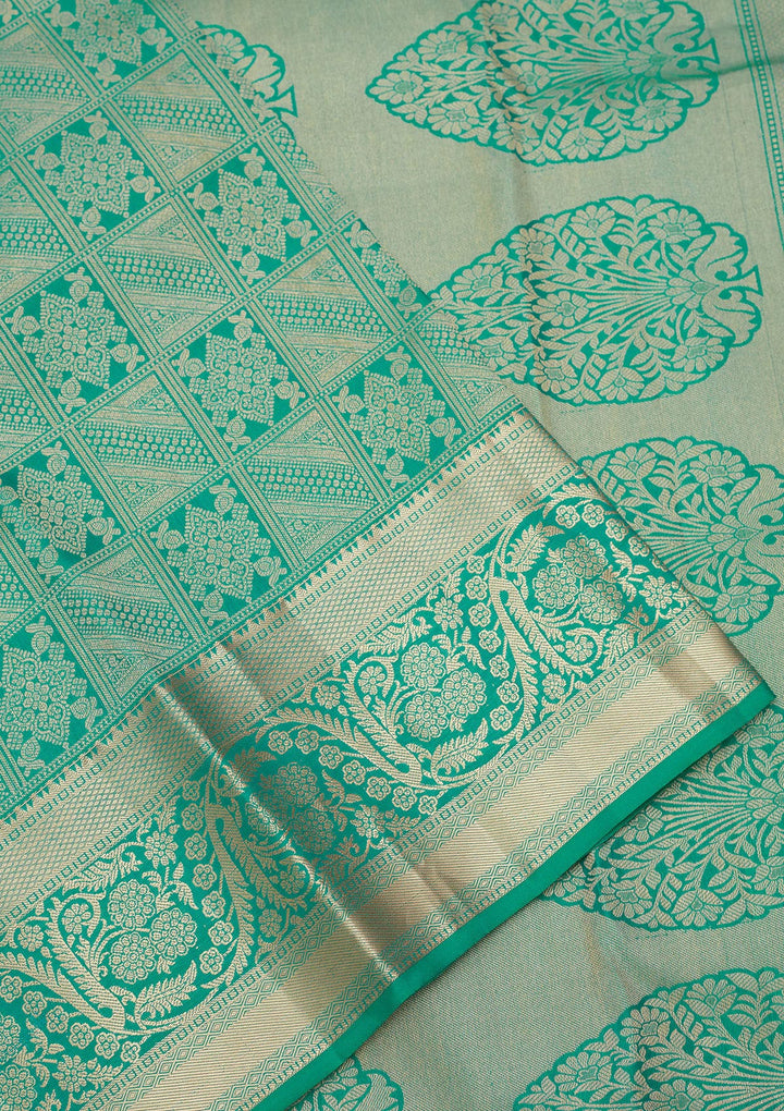 Turquoise Blue Silk Jaal Saree With Matching Blouse Piece