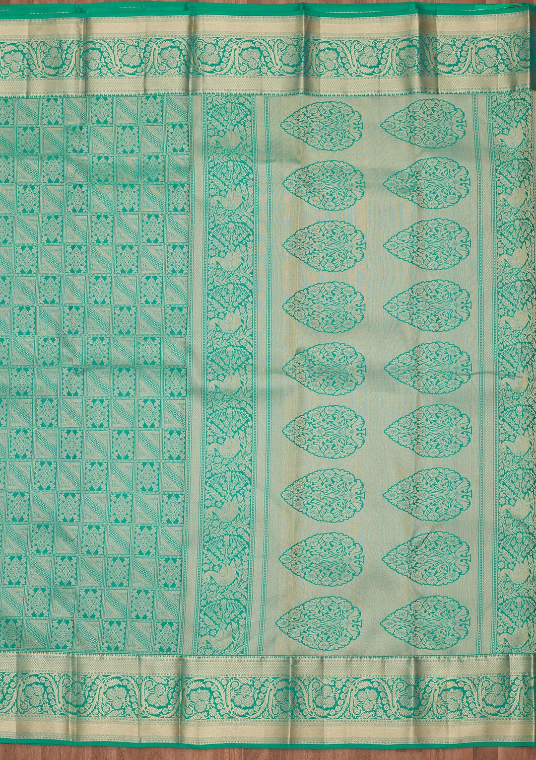 Turquoise Blue Silk Jaal Saree With Matching Blouse Piece