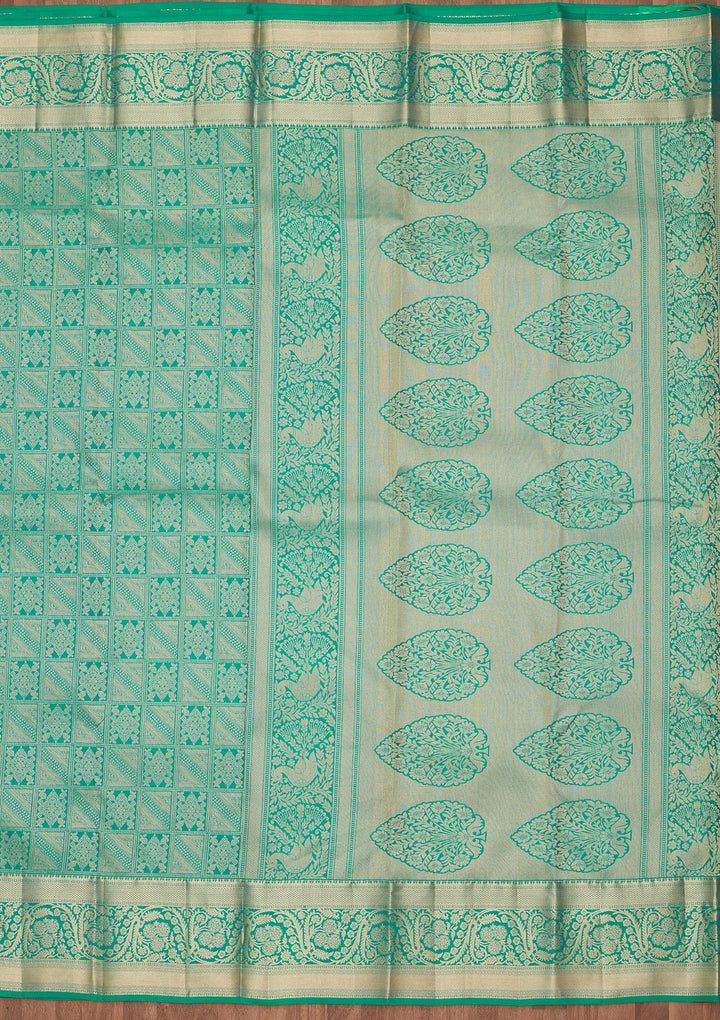 Turquoise Blue Silk Jaal Saree With Matching Blouse Piece