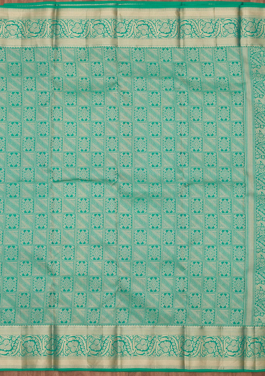 Turquoise Blue Silk Jaal Saree With Matching Blouse Piece