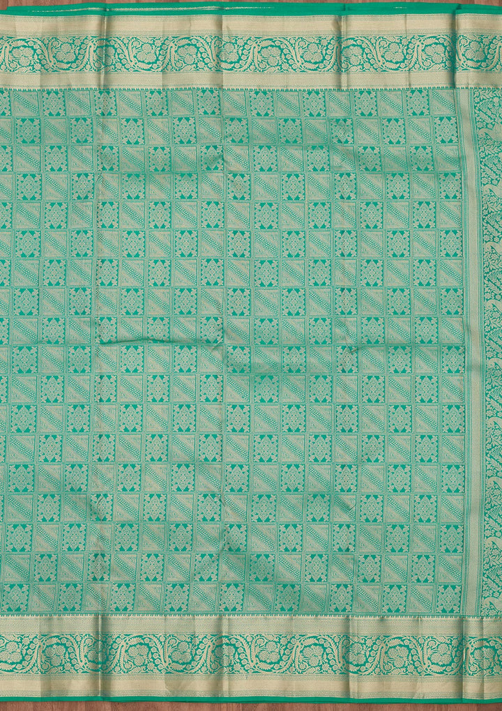 Turquoise Blue Silk Jaal Saree With Matching Blouse Piece