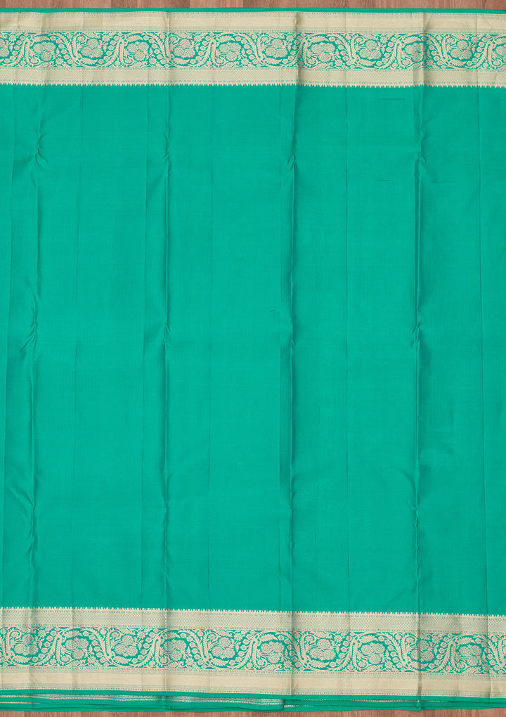 Turquoise Blue Silk Jaal Saree With Matching Blouse Piece