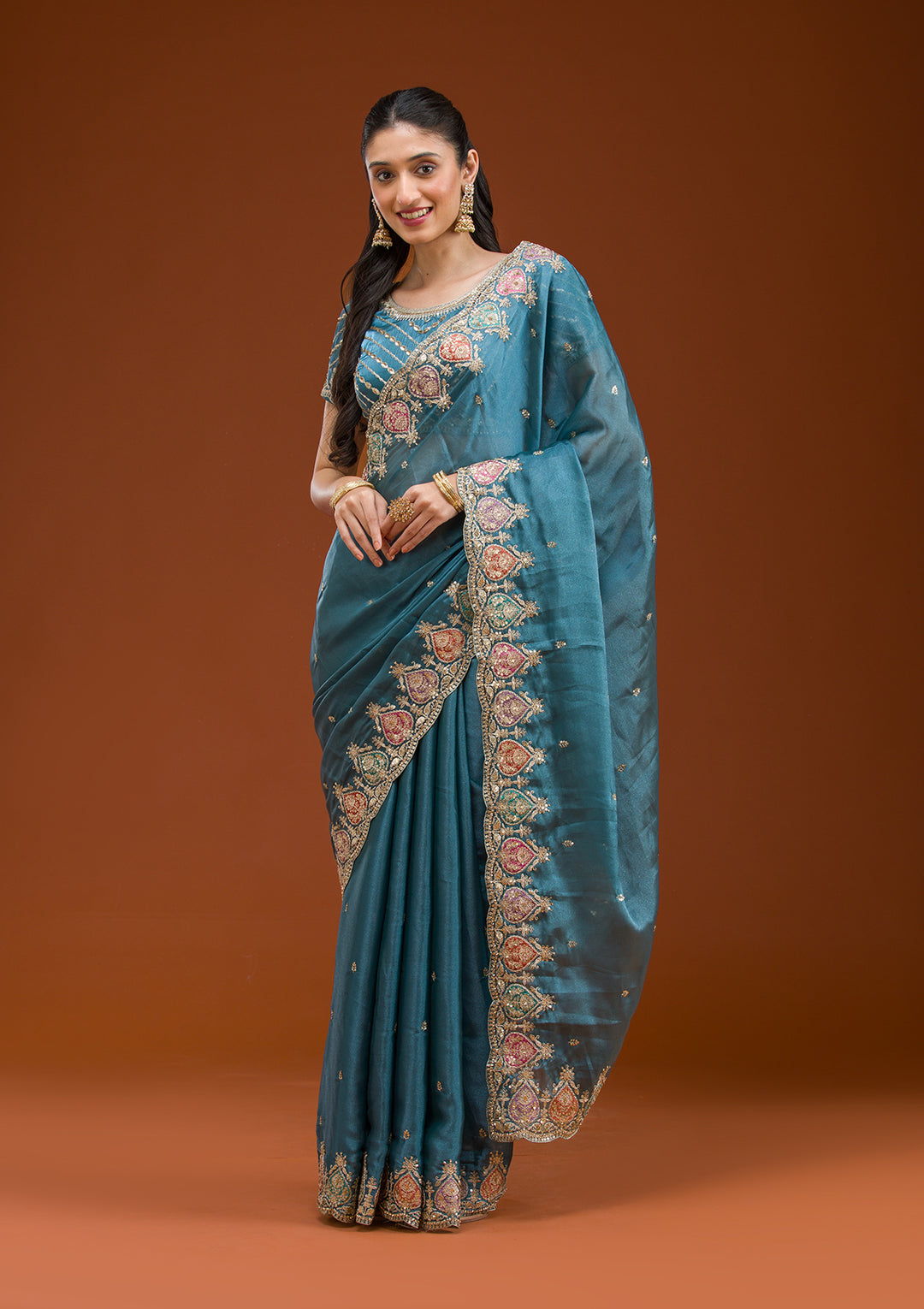 Peacock Blue Tissue Gold Zariwork Saree With Matching Blouse Piece