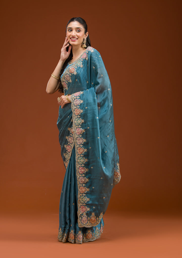 Peacock Blue Tissue Gold Zariwork Saree With Matching Blouse Piece