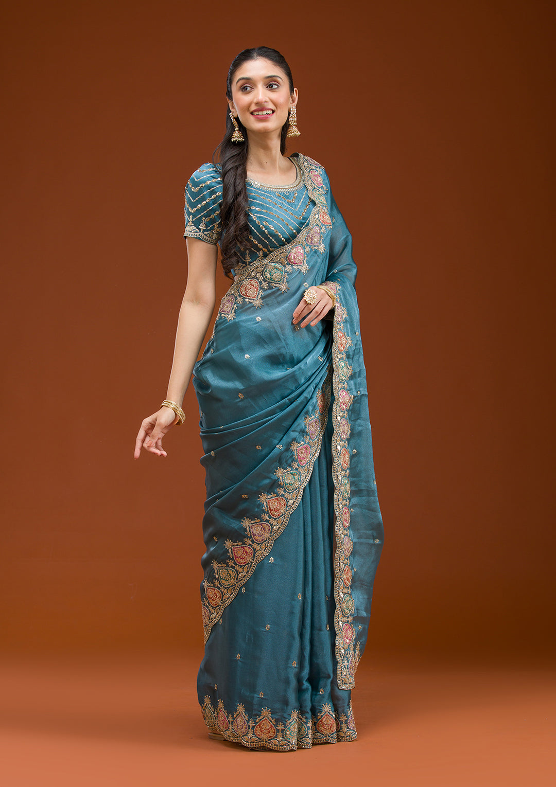 Peacock Blue Tissue Gold Zariwork Saree With Matching Blouse Piece