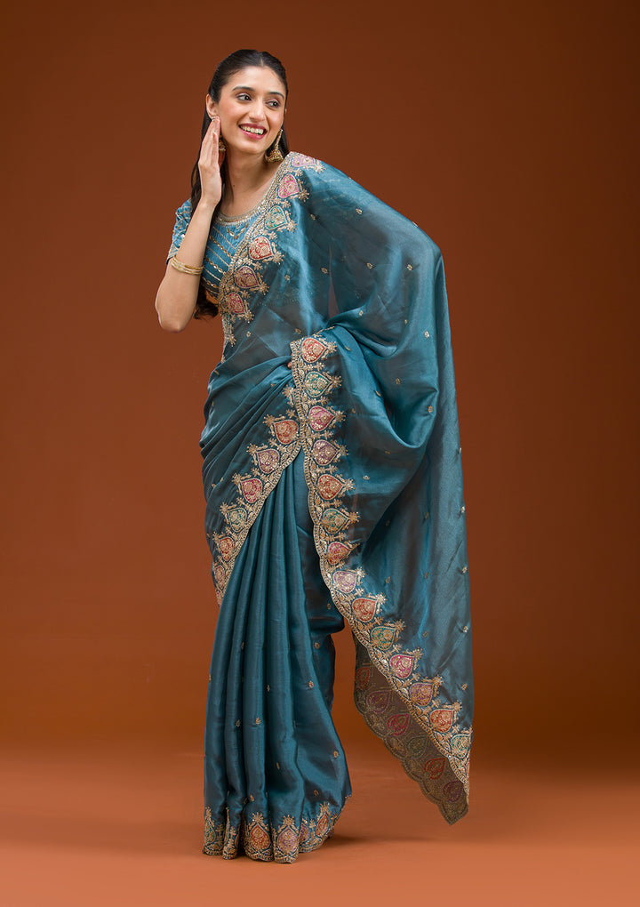 Peacock Blue Tissue Gold Zariwork Saree With Matching Blouse Piece