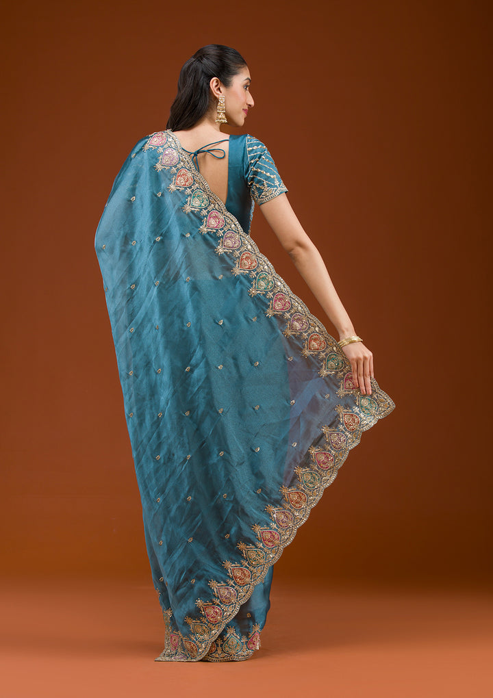 Peacock Blue Tissue Gold Zariwork Saree With Matching Blouse Piece