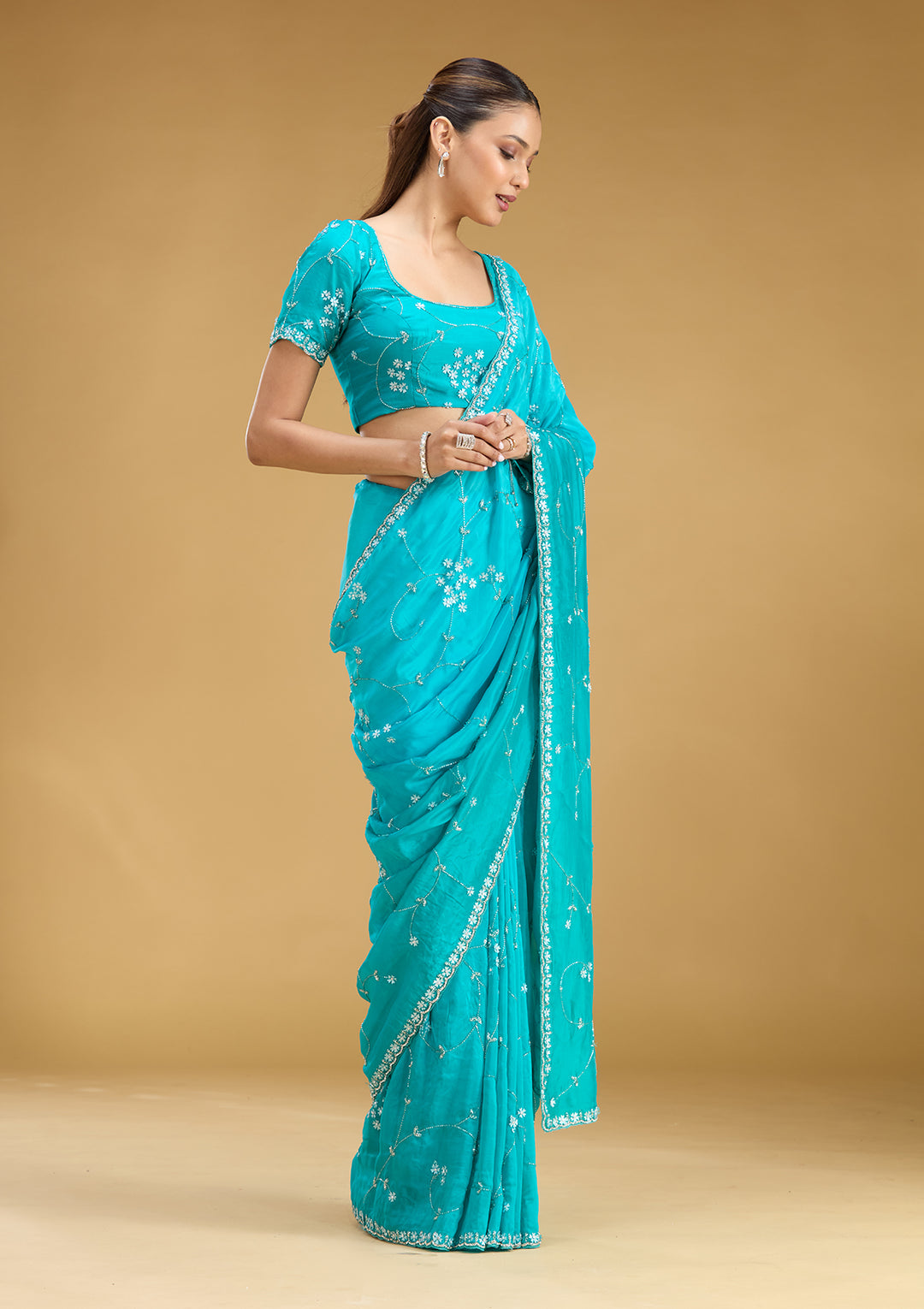 Turquoise Blue Satin Cutdana Saree With Matching Blouse Piece
