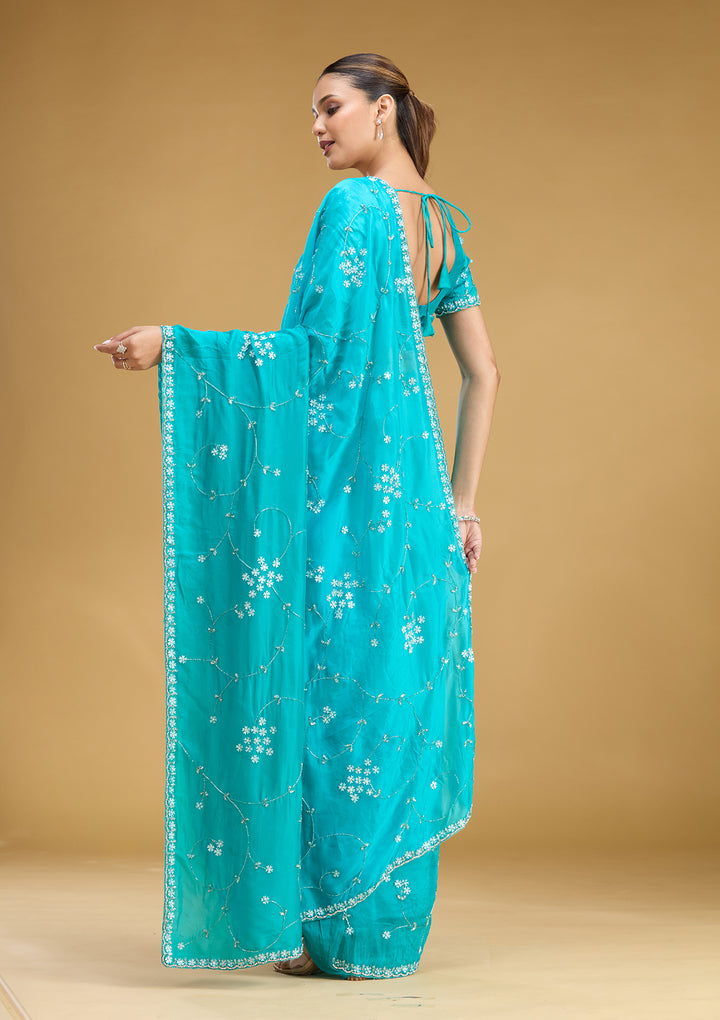 Turquoise Blue Satin Cutdana Saree With Matching Blouse Piece