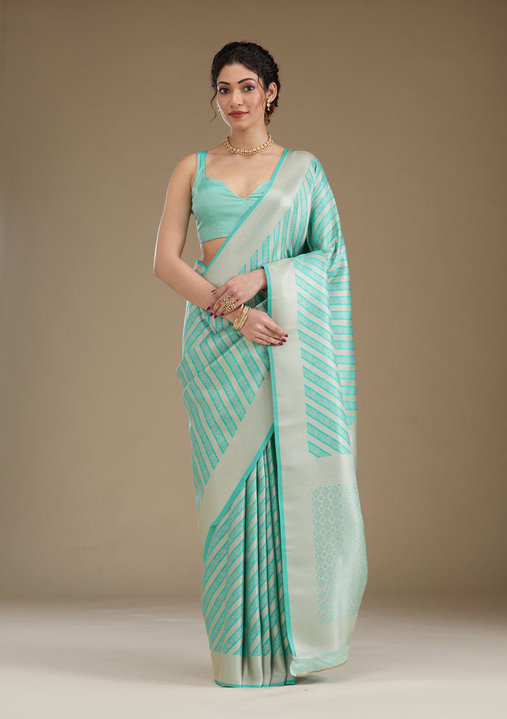 Koskii Silk Turquoise Saree with Zariwork – Elegant Evening Wear
