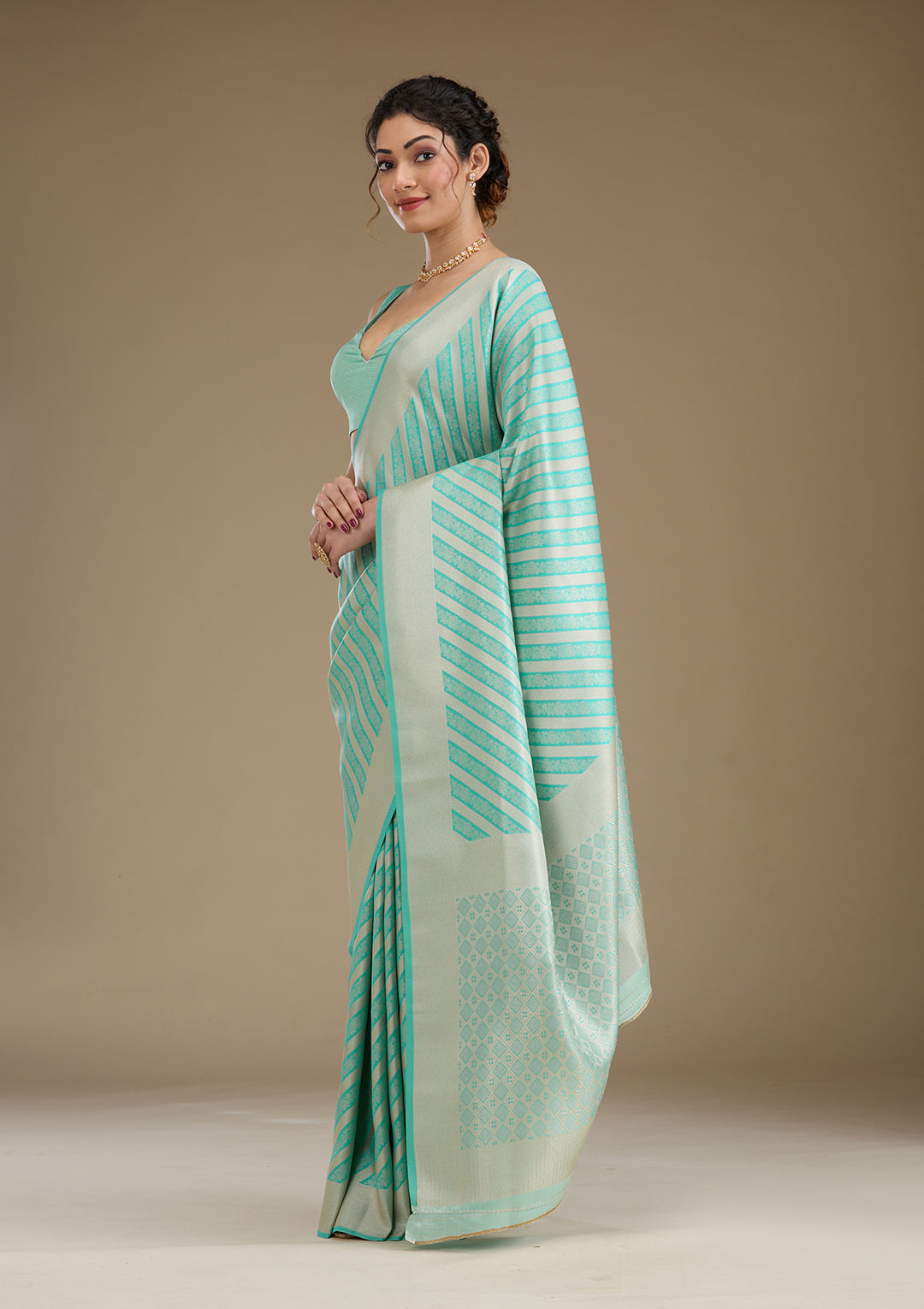 Koskii Silk Turquoise Saree with Zariwork – Elegant Evening Wear