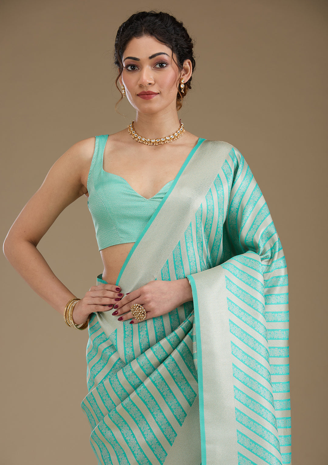 Koskii Silk Turquoise Saree with Zariwork – Elegant Evening Wear