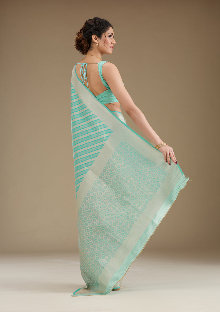 Koskii Silk Turquoise Saree with Zariwork – Elegant Evening Wear