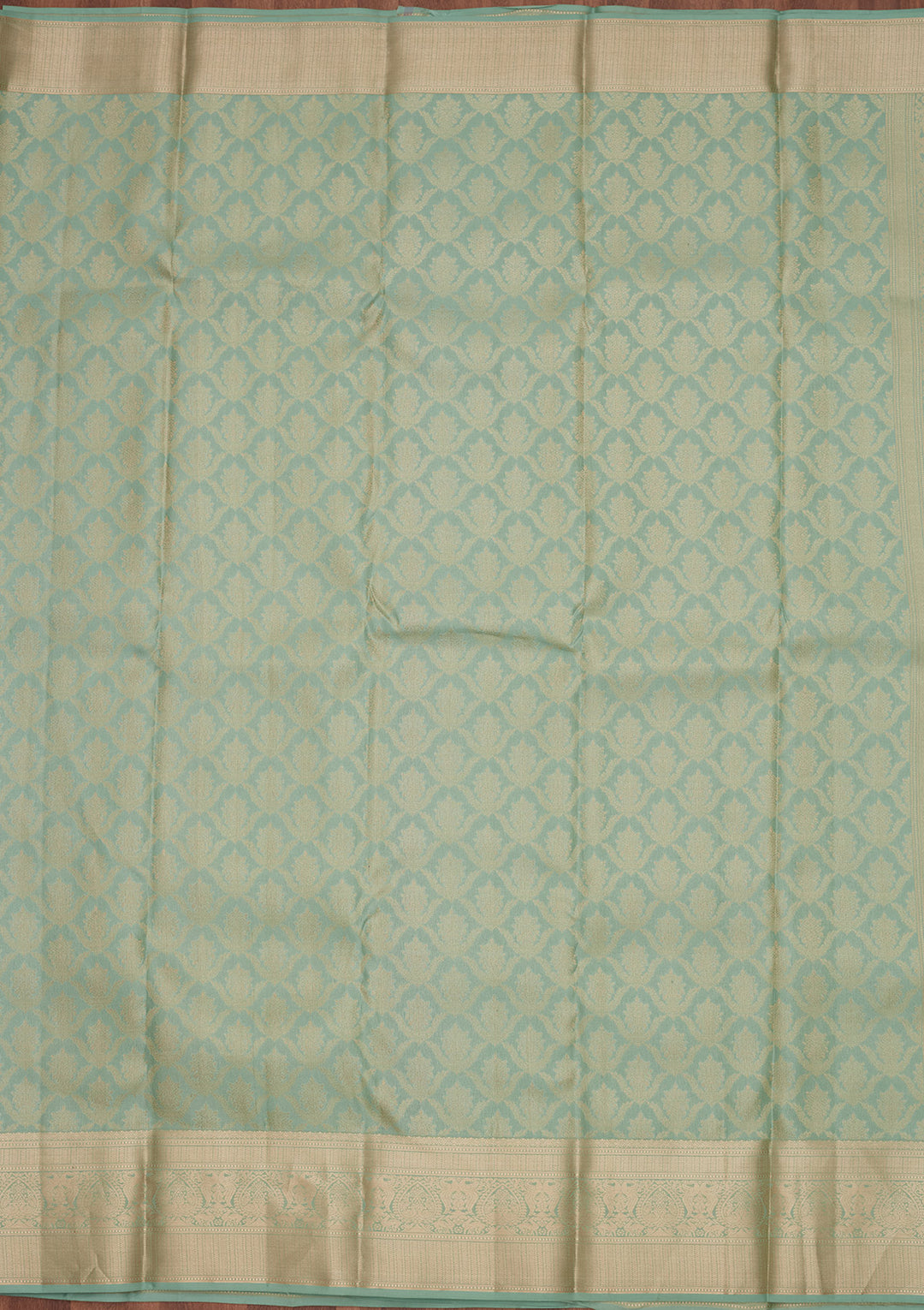 Sea Green Silk Jaal Saree With Matching Blouse Piece