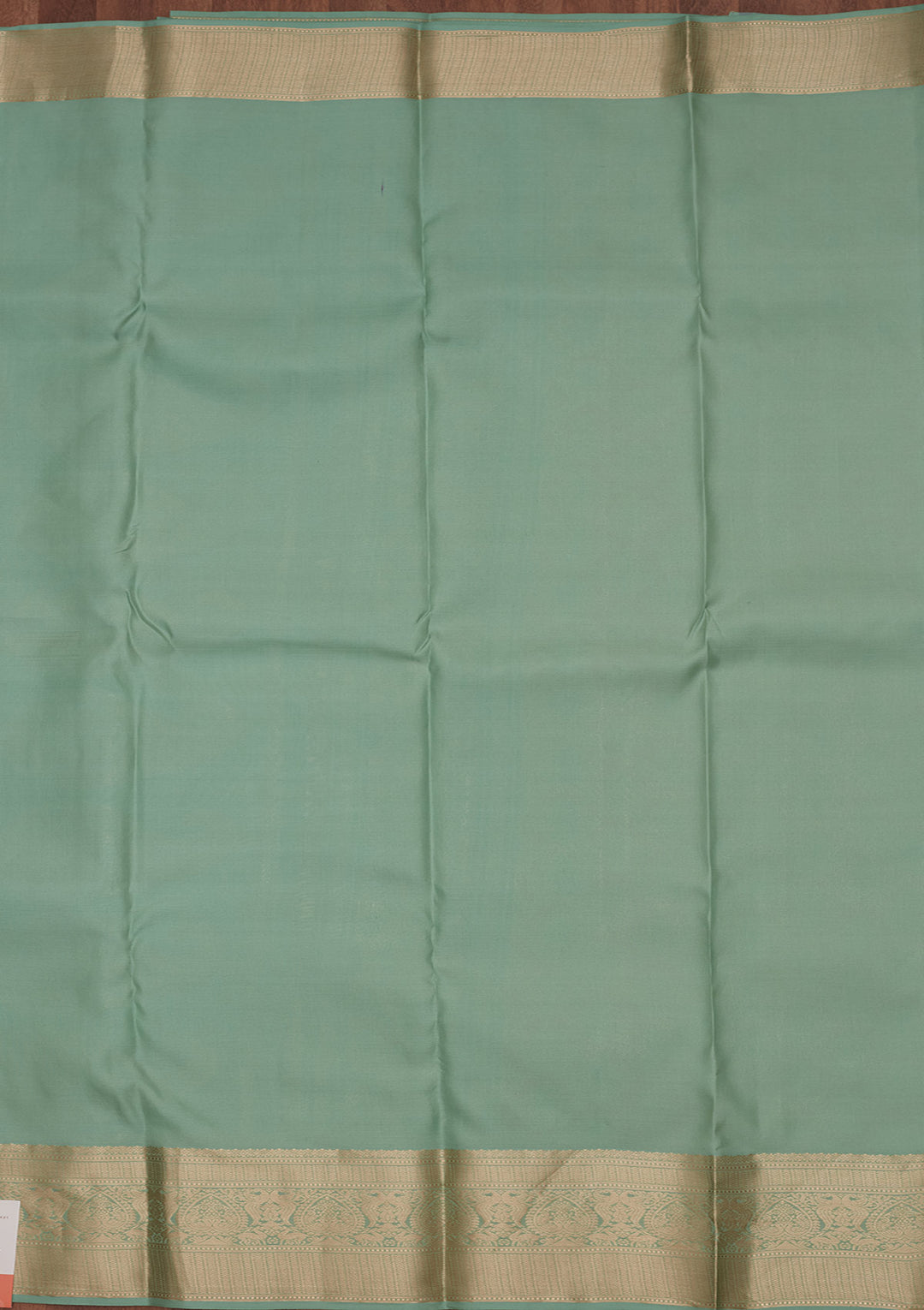 Sea Green Silk Jaal Saree With Matching Blouse Piece