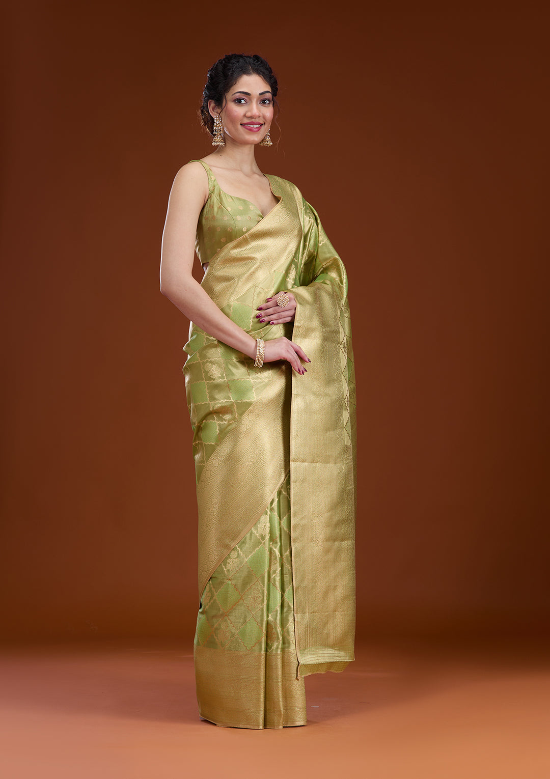 Leaf Green Silk Checks Gold Zariwork Saree With Matching Blouse Piece