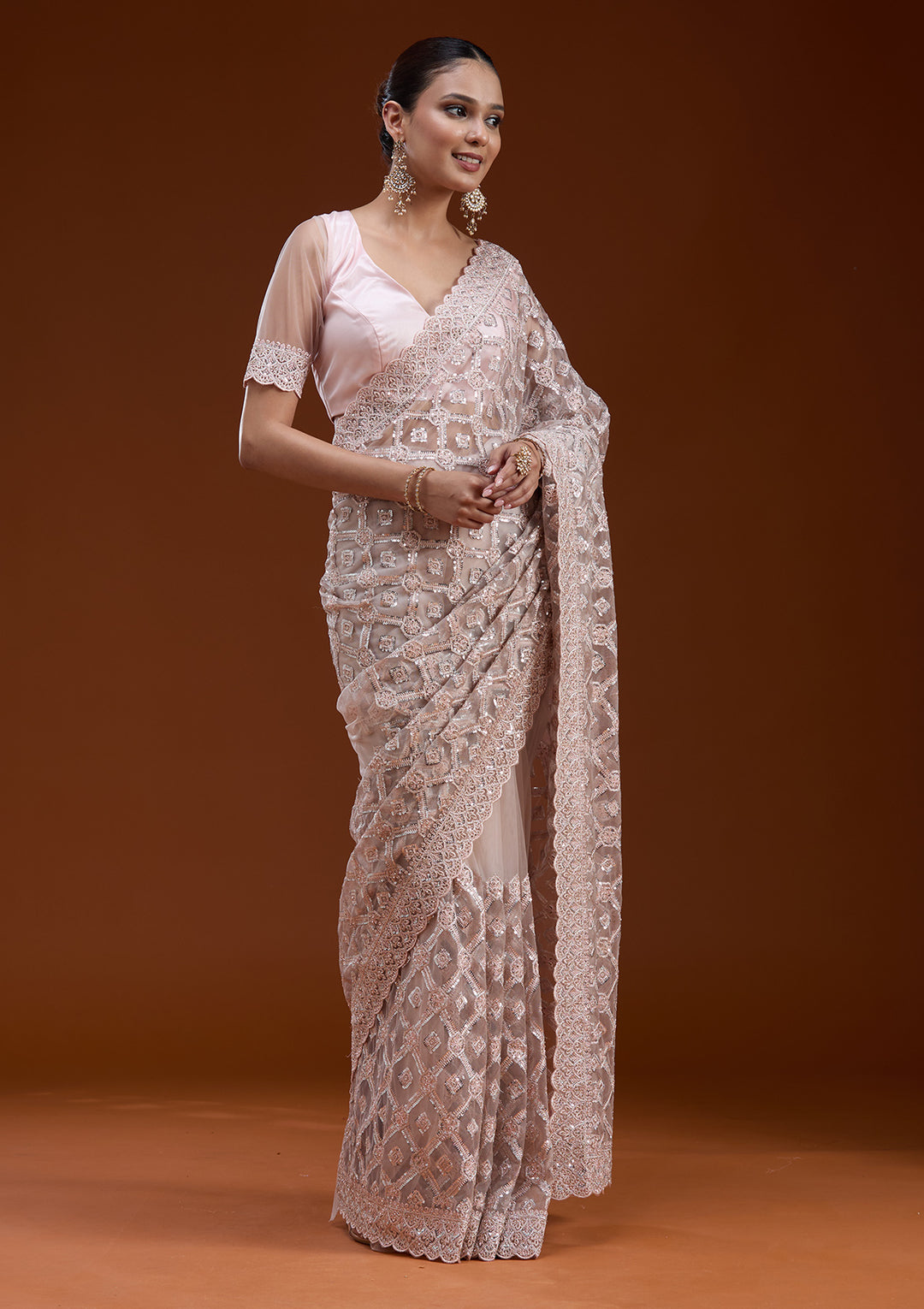 Peach Net Silver Stonework Saree With Matching Blouse Piece