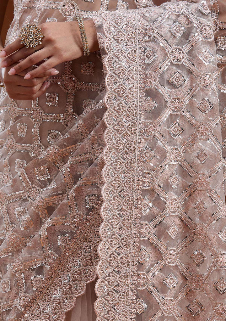 Peach Net Silver Stonework Saree With Matching Blouse Piece