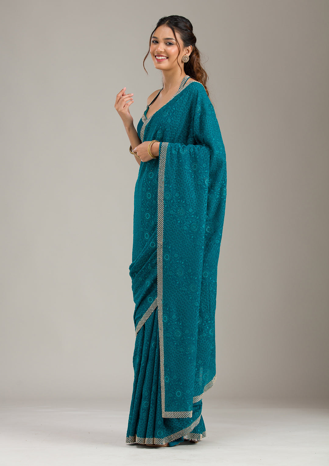 Teal Green Georgette Threadwork Saree With Matching Blouse Piece