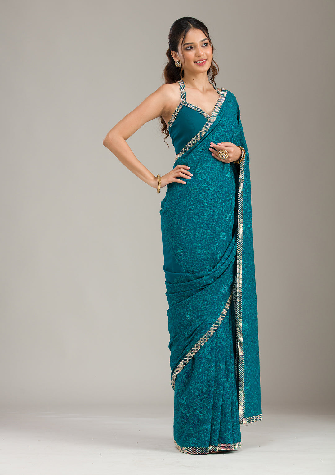 Teal Green Georgette Threadwork Saree With Matching Blouse Piece