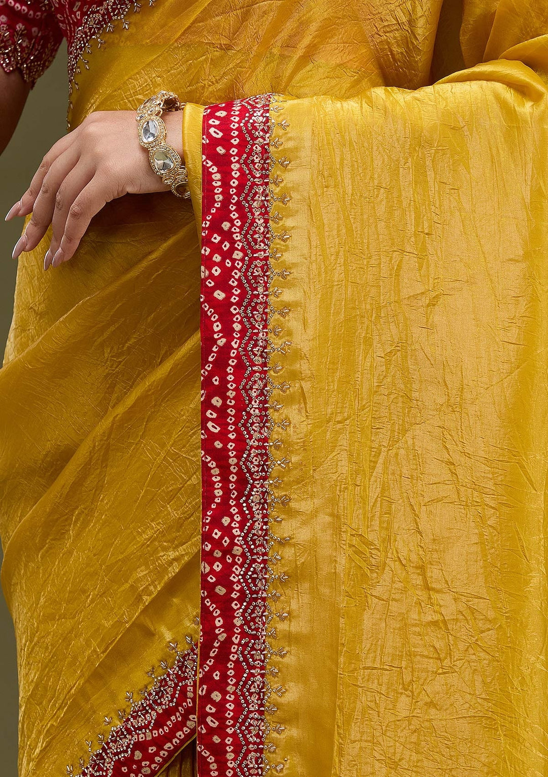 Mustard Tissue Bandhej Cutdana Saree With Matching Blouse Piece