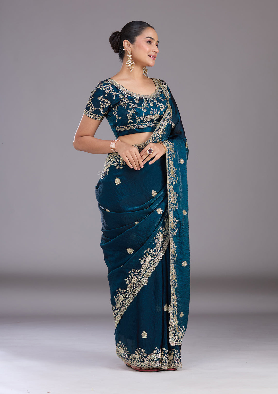 Peacock Blue Tissue Gold Zariwork Saree With Matching Blouse Piece