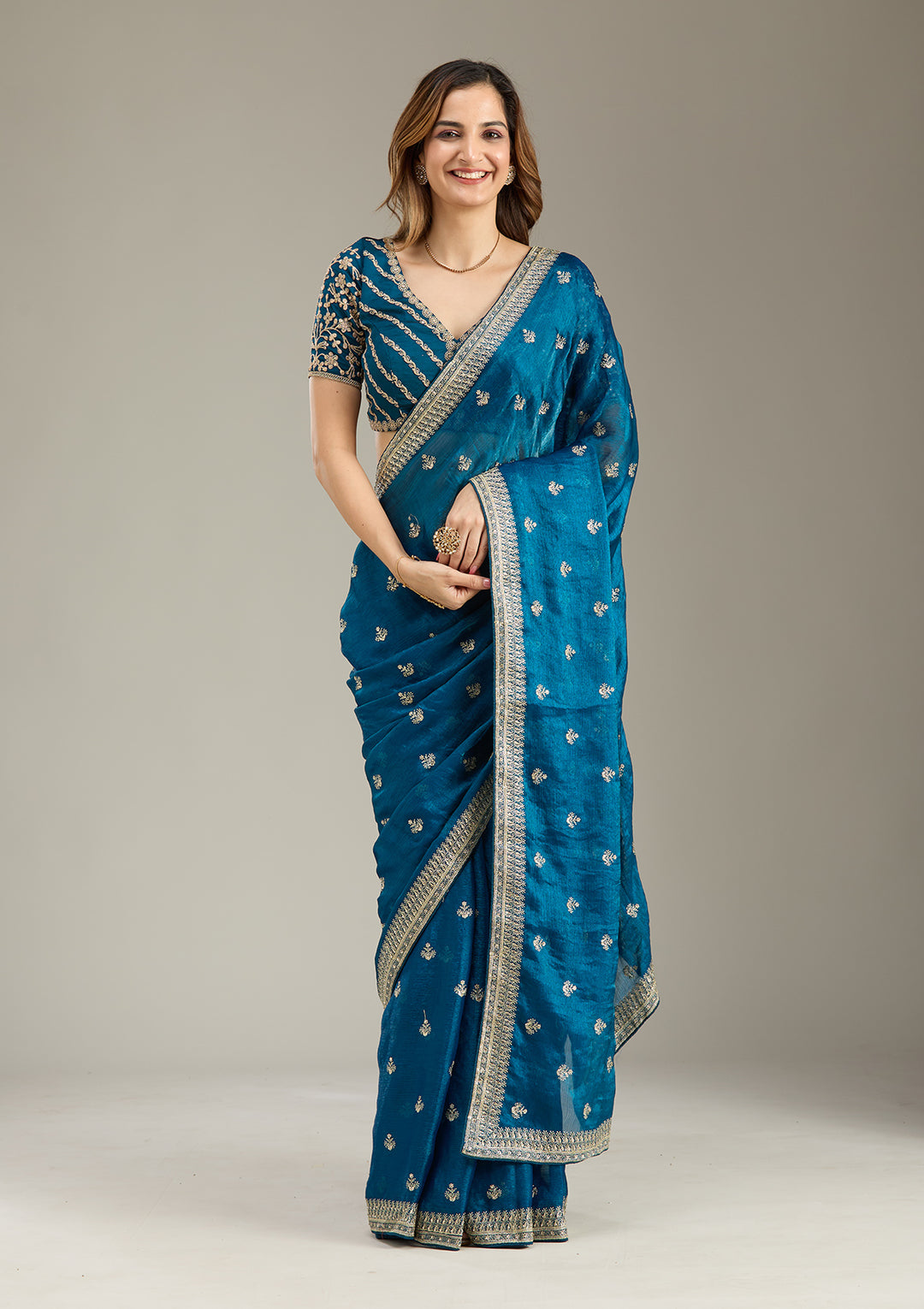 Peacock Blue Tissue Gold Zariwork Saree With Matching Blouse Piece