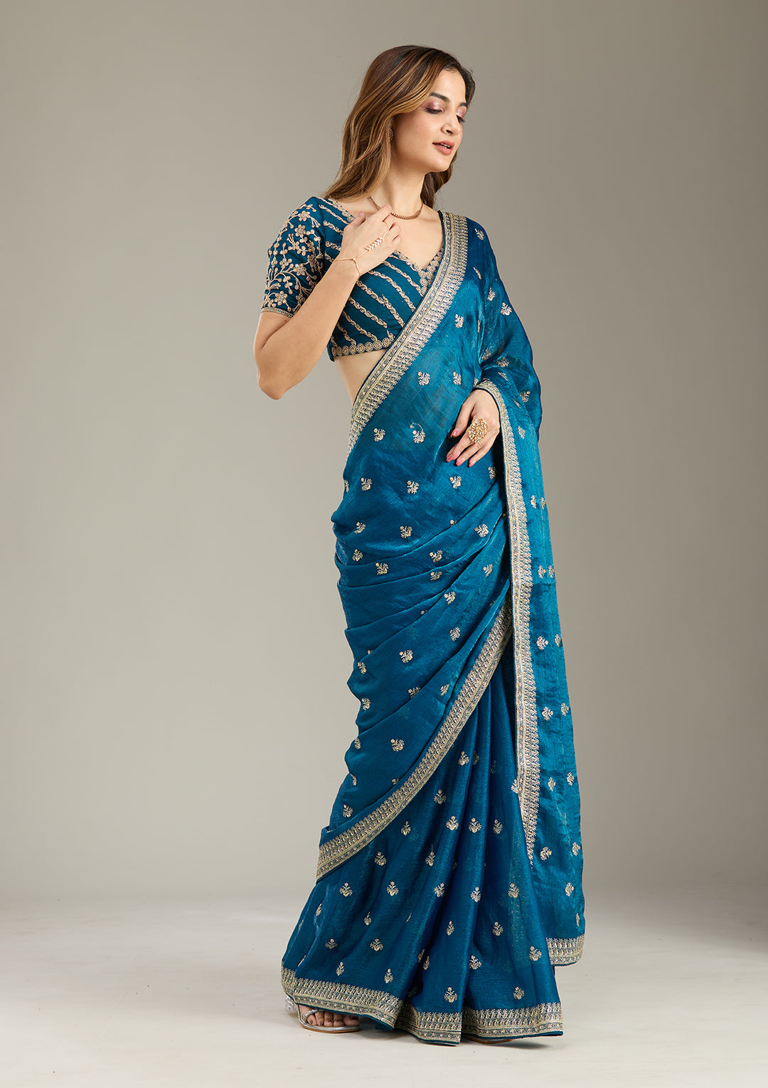 Peacock Blue Tissue Gold Zariwork Saree With Matching Blouse Piece