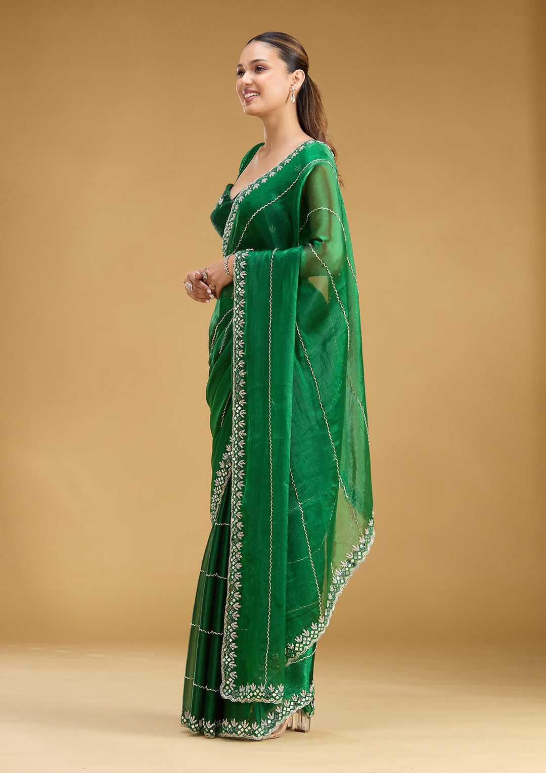 Bottle Green Tissue Cutdana Saree With Matching Blouse Piece